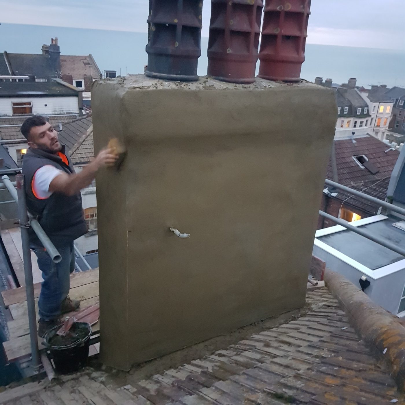 Chimney repair and rendering by Winter Shield Roofing