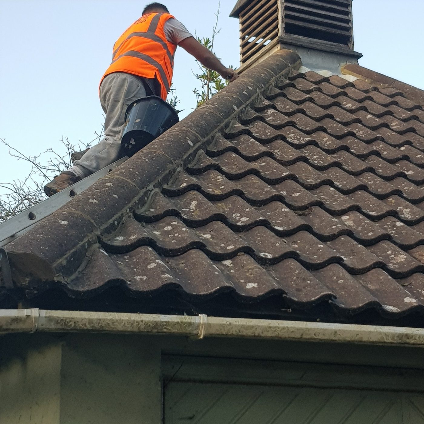 Ridge and chimney roof repair