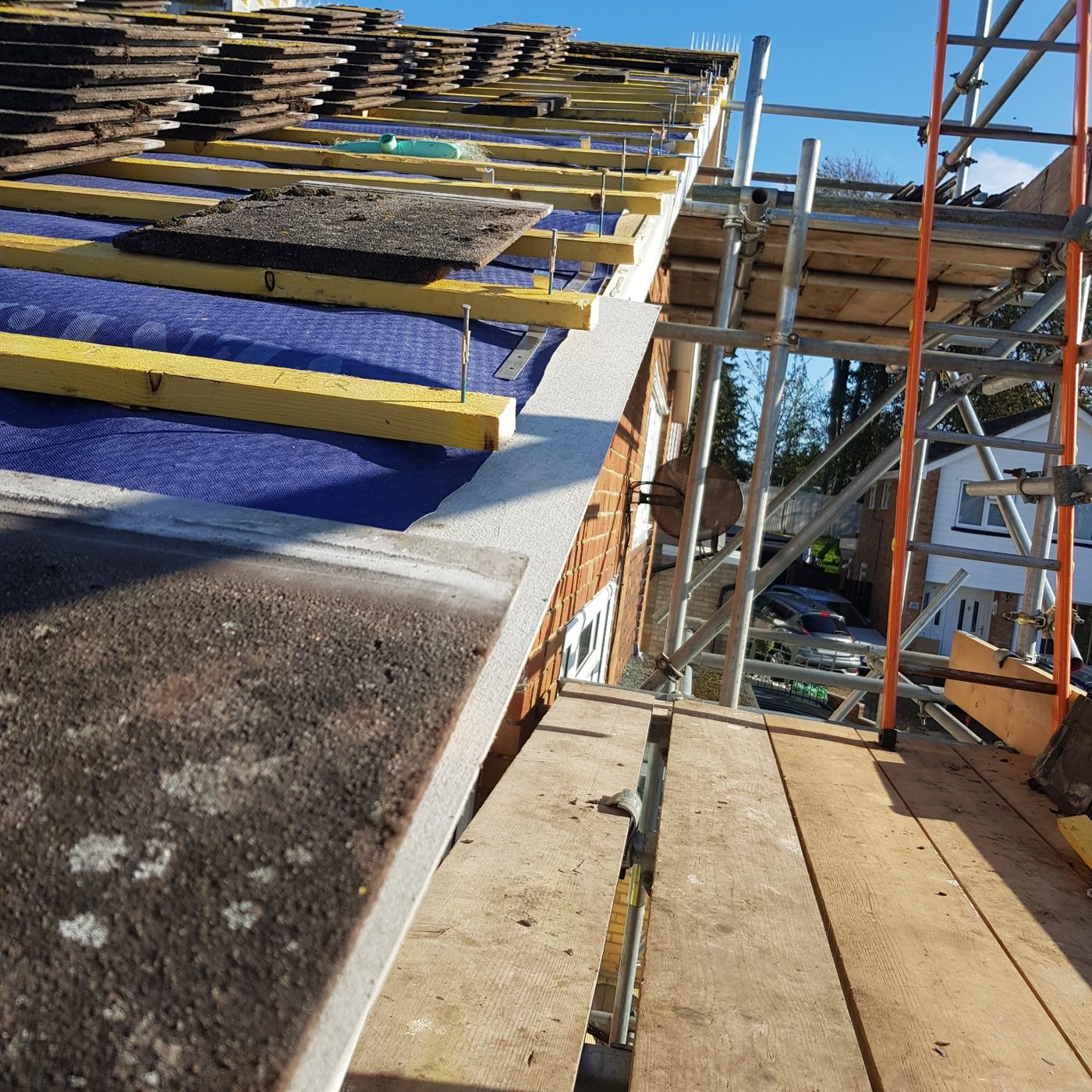 Roofing work with scaffold access